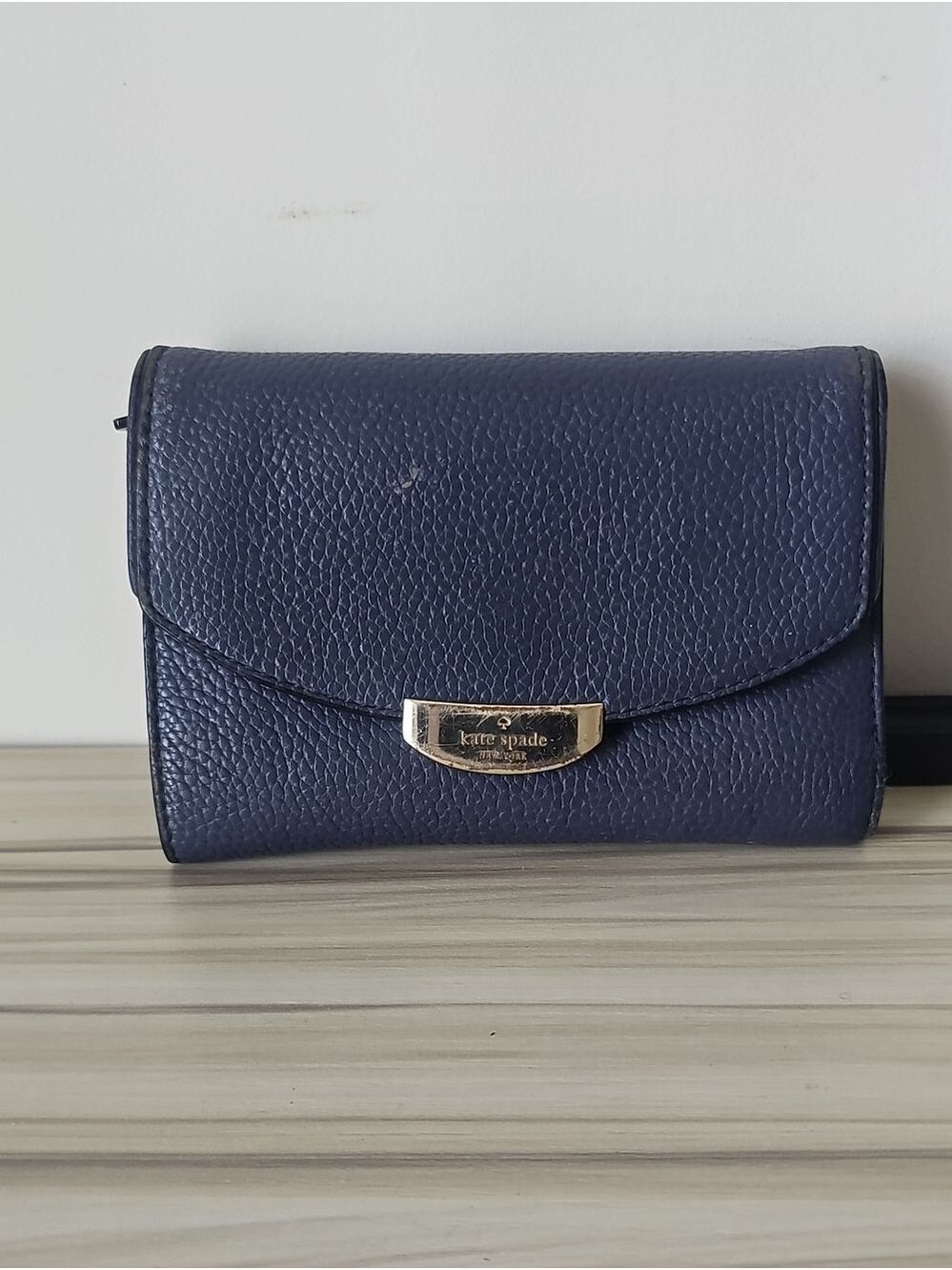 kate spade navy pebbled leather tri-fold wallet with gold plaque